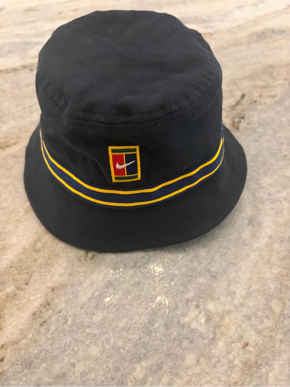 Nike Black Bucket Hat with Yellow Trim and Embroidered Crest
